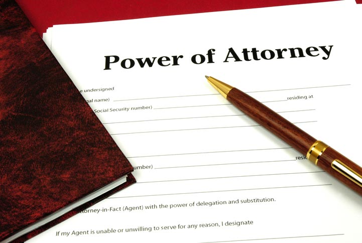 Power of Attorney contract with pen